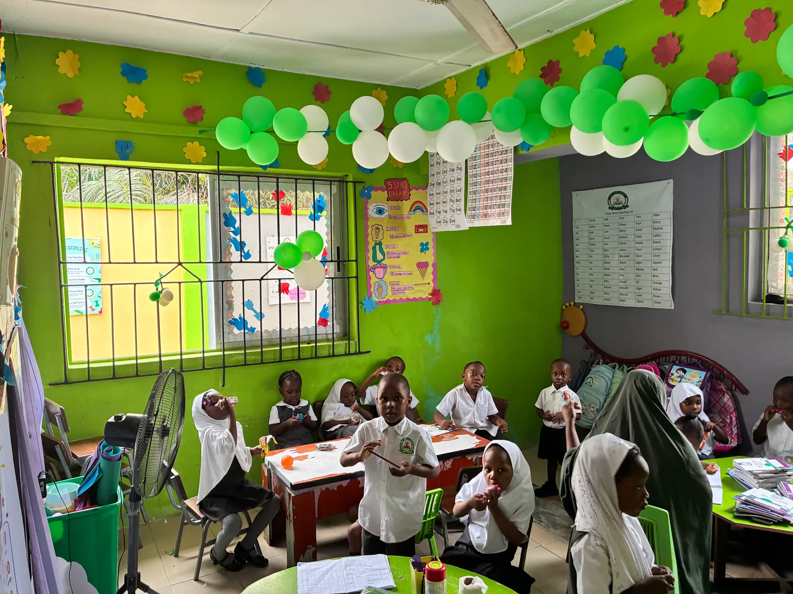 Nursery pupils at their tables during a class activity